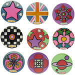 "PETER MAX" GROUP OF NINE LATE 1960s BUTTONS FEATURING HIS DESIGNS.