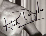 KIRK DOUGLAS SIGNED "SPARTACUS" PUBLICITY PHOTO.