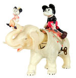 MICKEY AND MINNIE RIDING ELEPHANT LARGE CELLULOID WIND-UP.