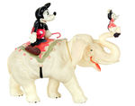 MICKEY AND MINNIE RIDING ELEPHANT LARGE CELLULOID WIND-UP.