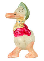 UNUSUAL FEMALE DONALD DUCK PLASTER FILLED CELLULOID FIGURE.