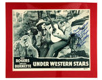 ROY ROGERS "UNDER WESTERN STARS" SIGNED LOBBY CARD.