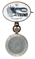 “THE ‘TRUMP’ CYCLOMETER” RARE C. 1896 BICYCLE DEVICE ADVERTISING BADGE.