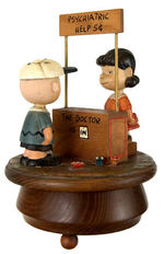 PEANUTS "THE DOCTOR IS IN" WOODEN FIGURAL MUSIC BOX BY ANRI, ITALY.