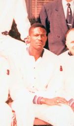 “1956 OLYMPIC CHAMPIONS MELBOURNE AUSTRALIA” BASKETBALL TEAM PRESENTATION PHOTO WITH BILL RUSSELL.