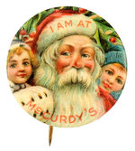 LARGE BEAUTIFUL AND EARLY "I AM AT McCURDY'S" SANTA BUTTON.