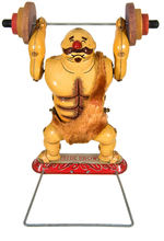 “SIDE SHOW” STRONG MAN LIFTING WEIGHTS WIND-UP TIN TOY BY TPS.