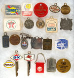 COLLECTION OF 22 GASOLINE KEY FOBS FROM THE 1930s TO THE 1970s.