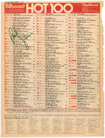 PAUL SIMON SIGNED "BILLBOARD HOT 100" CHART PAGE.