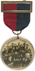 "UNIVERSITY OF PENNA." RARE DOMED CELLO ON RIBBON BADGE C. 1895.