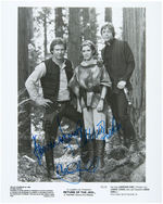 "STAR WARS: RETURN OF THE JEDI" CAST-SIGNED STILL - HARRISON FORD, CARRIE FISHER & MARK HAMILL.