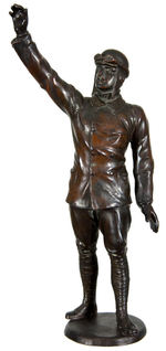 EARLY AVIATOR METAL STATUE.