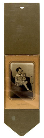 PHOTO OF CHILD WITH SHIRLEY TEMPLE DOLL.