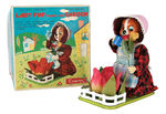 “LADY PUP TENDING HER GARDEN” BOXED BATTERY TOY.