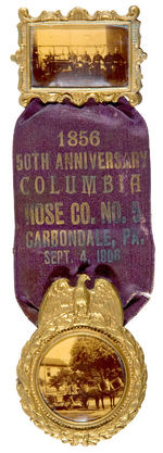 PENNSYLVANIA 1906 FIRE BADGE CONTAINING TWO OUTSTANDING REAL PHOTO CELLULOIDS.