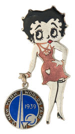 BETTY BOOP “1939 NEW YORK WORLD’S FAIR” ENAMEL ON SILVERED BRASS PIN.