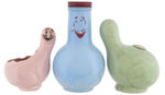 “SHMOO” LOT OF FOUR FIGURAL ITEMS AND PENCIL BOX.