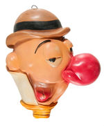 EGGHEAD FIGURAL STRING HOLDER.