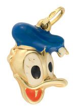 DONALD DUCK  HEAD AS TWO-SIDED 18k GOLD CHARM.