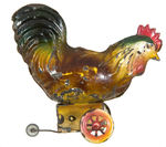 GERMAN PAINTED TIN CHICKEN WIND-UP TOY.