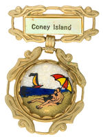 “CONEY ISLAND” BADGE WITH COLOR SCENE UNDER GLASS.