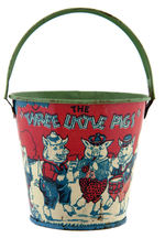 THREE LITTLE PIGS CHEIN SAND PAIL & SHOVEL PAIR.