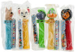 "YUMMY CANDY DISPENSERS" FULL BOX OF PEZ-LIKE DISPENSERS.