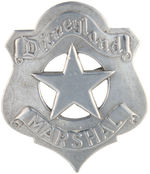 "DISNEYLAND/MARSHAL" RARE COPYRIGHTED METAL BADGE FROM THE 1950s.