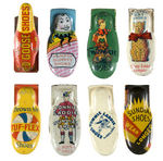 EIGHT LITHO TIN CLICKERS FOR SHOES.