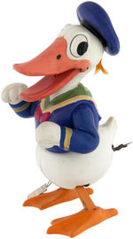 RARE DONALD DUCK WADDLING WIND-UP CELLULOID TOY.