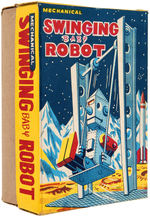 "SWINGING BABY ROBOT" BOXED WIND-UP.