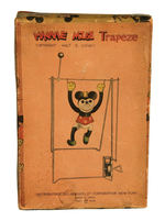 "MINNIE MOUSE TRAPEZE" BOXED CELLULOID WIND-UP.