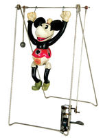 "MINNIE MOUSE TRAPEZE" BOXED CELLULOID WIND-UP.