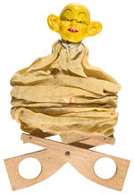 THE YELLOW KID BISQUE HEADED FIGURE SCISSORS TOY.