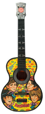 "MONKEES" TOY GUITAR.