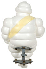 “MICHELIN” MAN LARGE PLASTIC FIGURE WITH MOUNTING BRACKET.