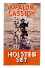 "HOPALONG CASSIDY HOLSTER SET" BOXED SET WITH GOLD-PLATED CAP GUN.