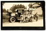 VINTAGE ORANGE CRUSH TRUCK PHOTO WITH CHILDREN.