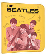 "THE BEATLES" THREE RING BINDER IN YELLOW.