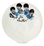 "THE BEATLES" ENGLISH CERAMIC CUPS AND SAUCER.