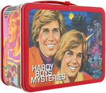 "HARDY BOY MYSTERIES" & "MR. MERLIN" UNUSED METAL LUNCHBOX PAIR WITH THERMOSES.