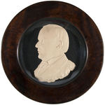 WILLIAM McKINLEY HIGH RELIEF PROFILE IN ROUND WOOD FRAME.