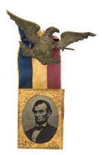 LINCOLN 1864 TINTYPE WITH RIBBON AND EAGLE PIN.