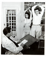 TERRY & THE PIRATES CREATOR MILTON CANIFF NEWS SERVICE PHOTO WITH MODELS IN BONDAGE.