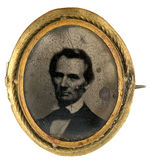 LINCOLN 1860 UNLISTED AND RARE OVAL FERROTYPE IN FRAME WITH PIN.