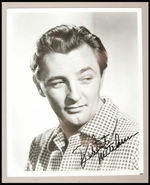 "ROBERT MITCHUM" SIGNED PUBLICITY PHOTO.