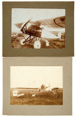 EARLY AVIATION MOUNTED PHOTOS WITH COUPLE AND DOG.