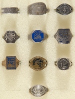 TEN EXPOSITION RINGS SPANNING 1893-1964.