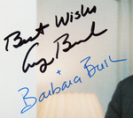 GEORGE AND BARBARA BUSH SIGNED PHOTO OF COUPLE IN THE WHITE HOUSE LIVING ROOM.