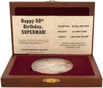 SUPERMAN 50th ANNIVERSARY SILVER POUND MEDALLION IN PRESENTATION CASE.